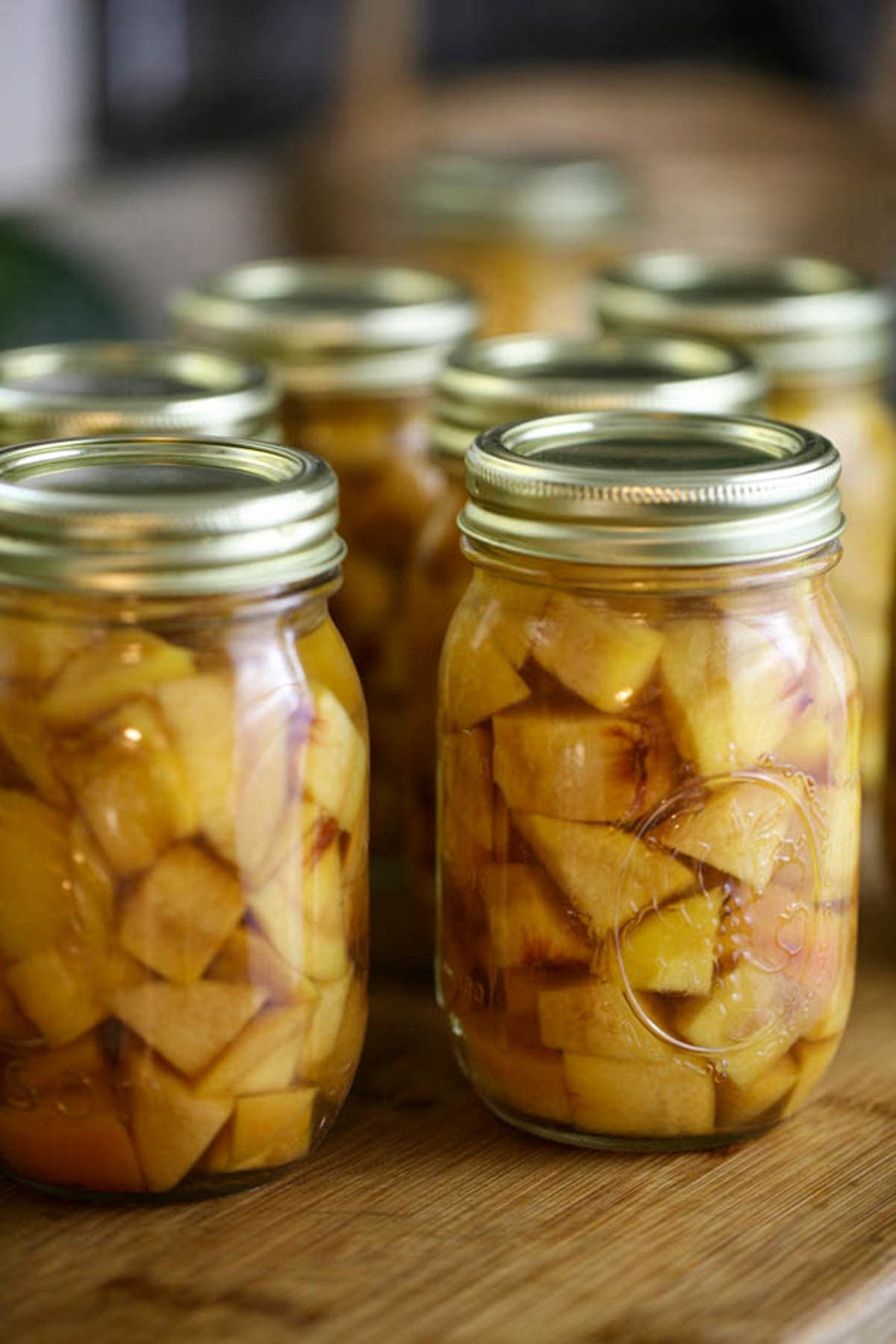 canned peaches ready for processing