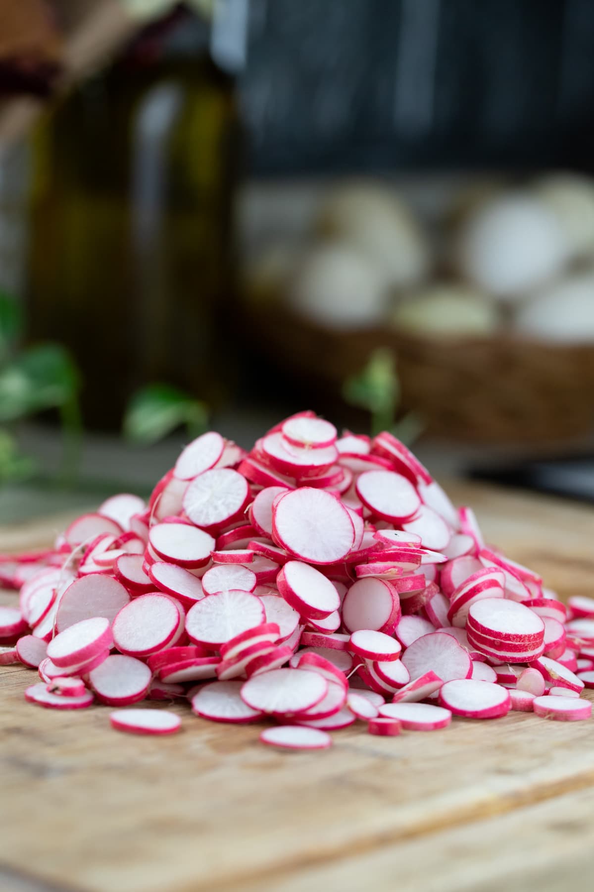 slicing the radishes into thin slices
