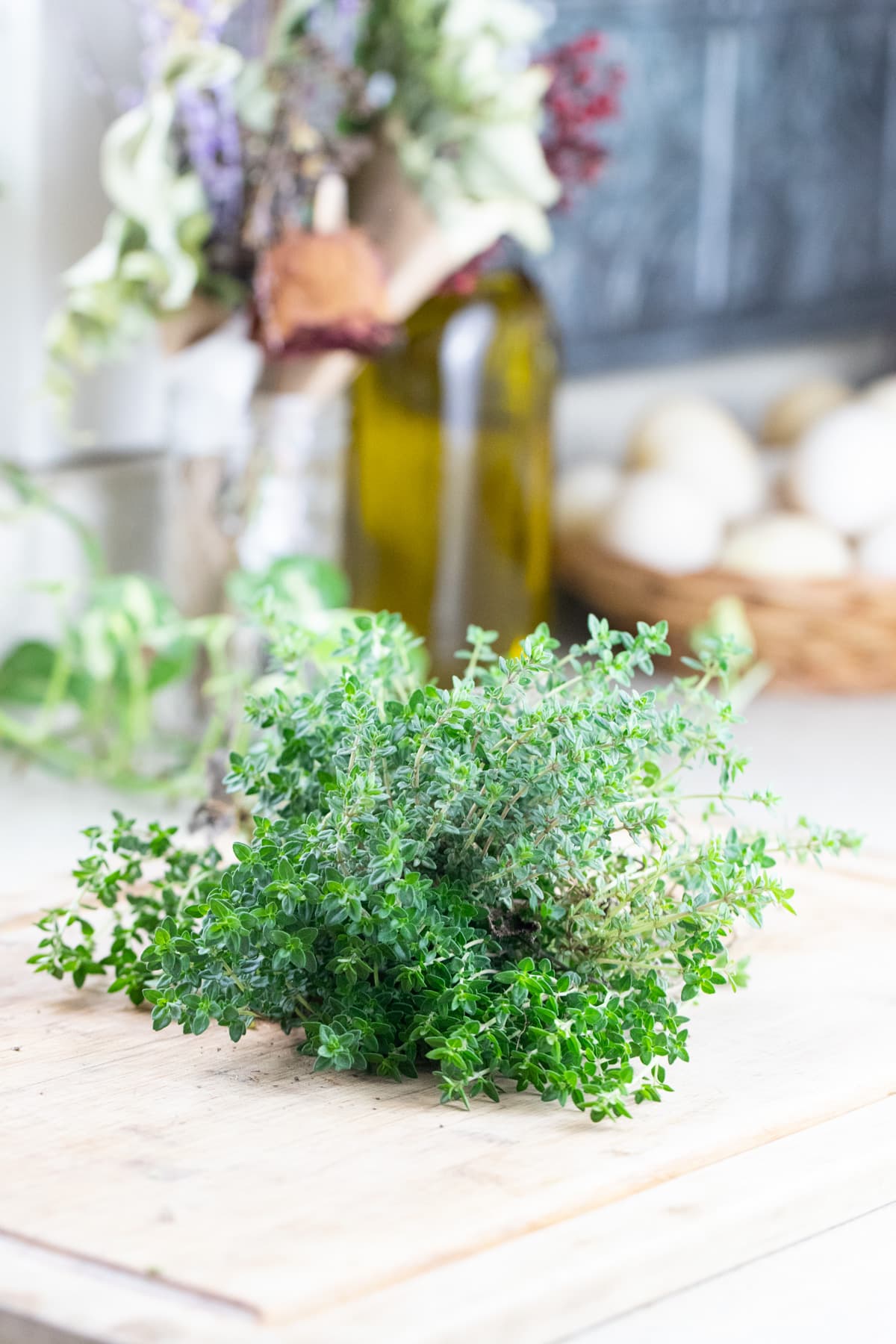 a bunch of thyme on the kitchen counter