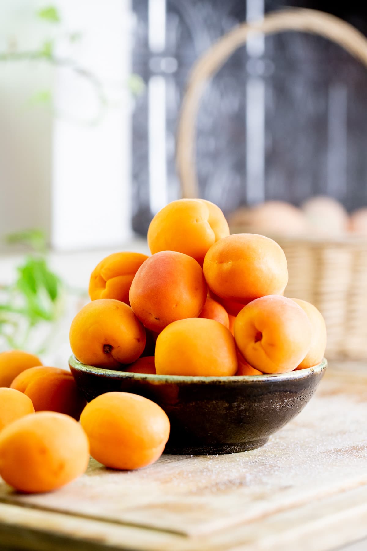 a bowl with fresh apricot