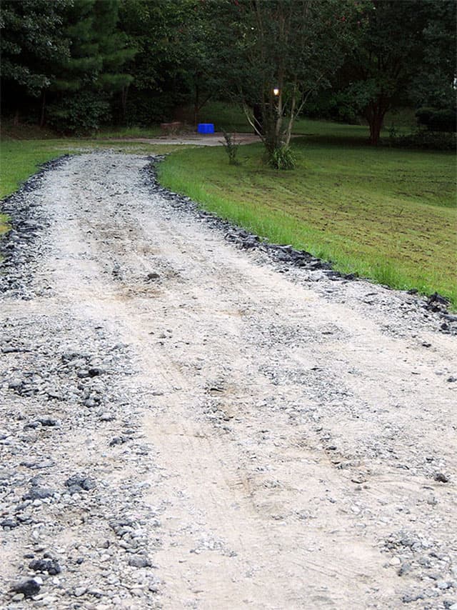 an asphalt millings driveway