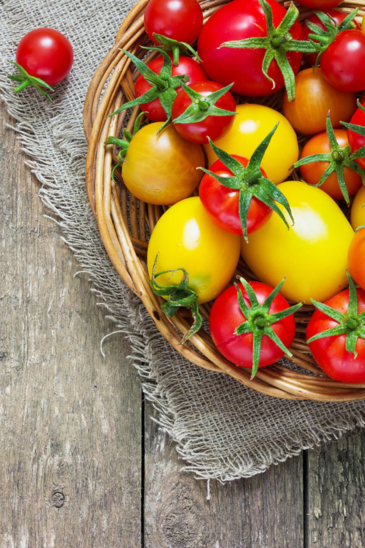 variety of tomatoes in a basket