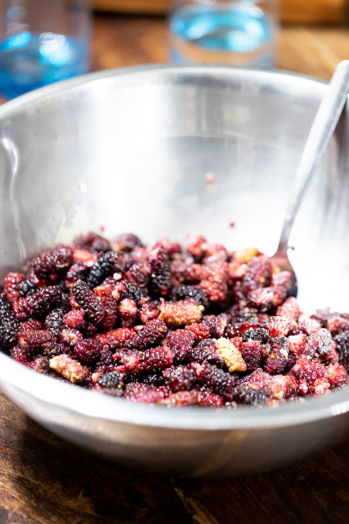 adding the filling ingredients to the mulberries