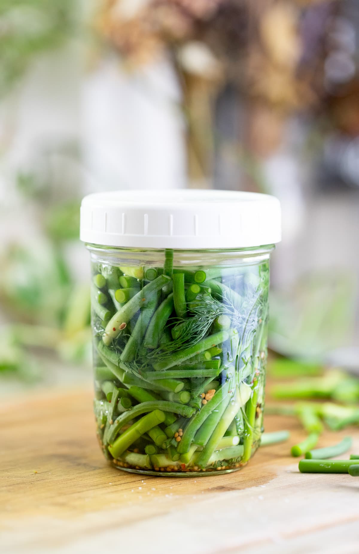 lacto fermented garlic scapes in a jar