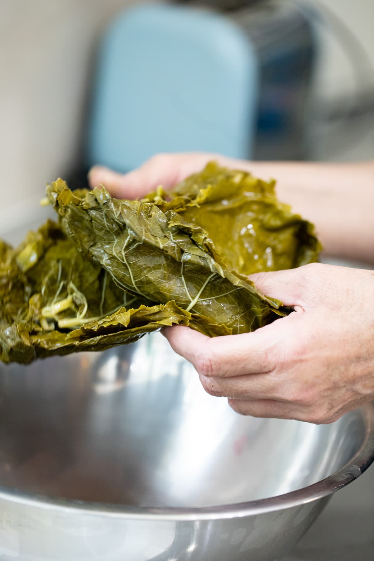 removing grape leaves from the jar