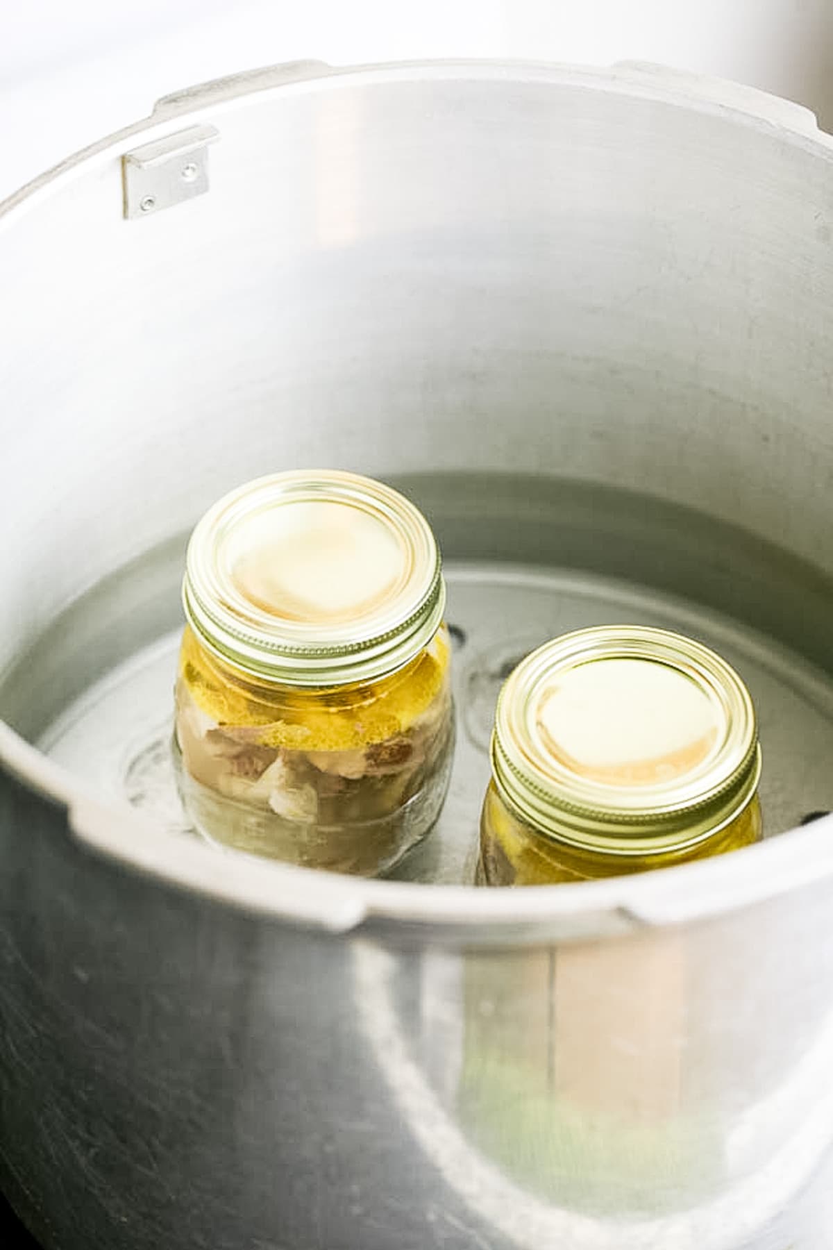 placing the jars in the pressure canner