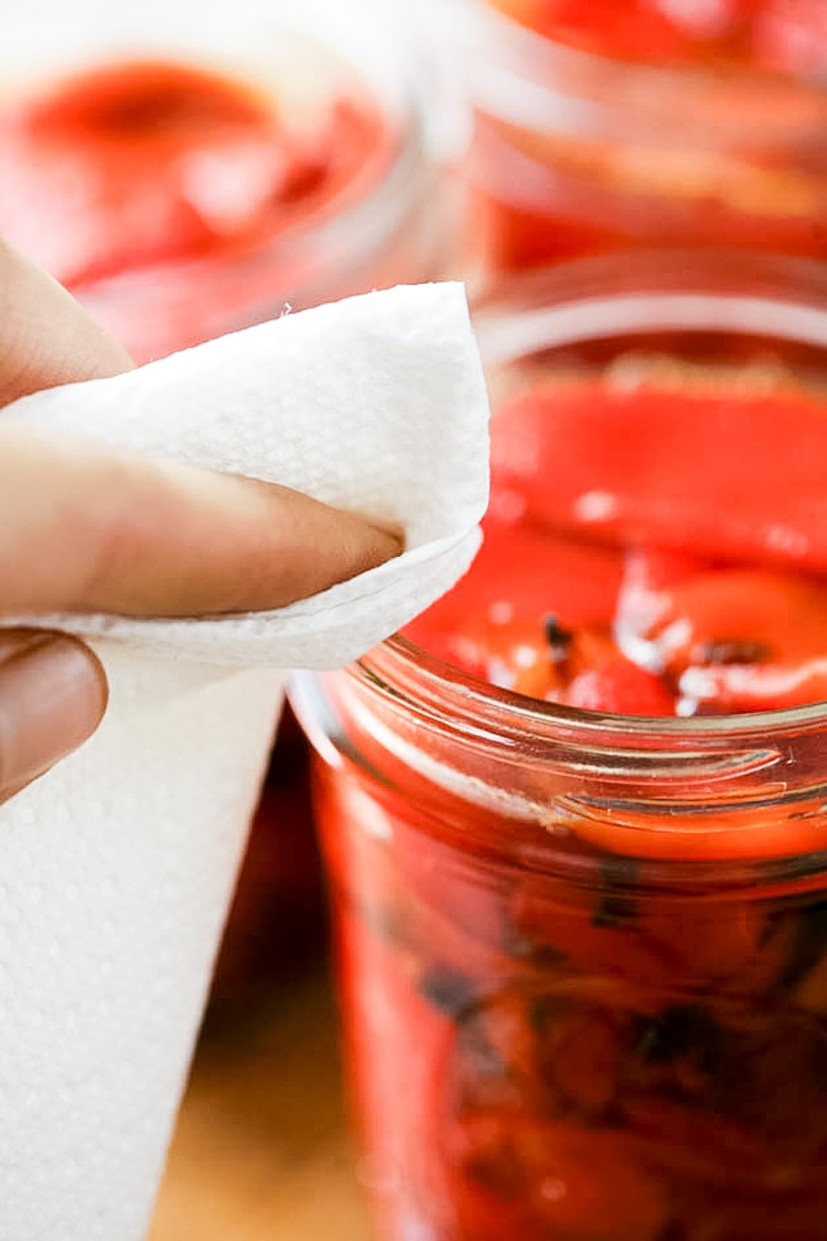 cleaning the rim of the jars