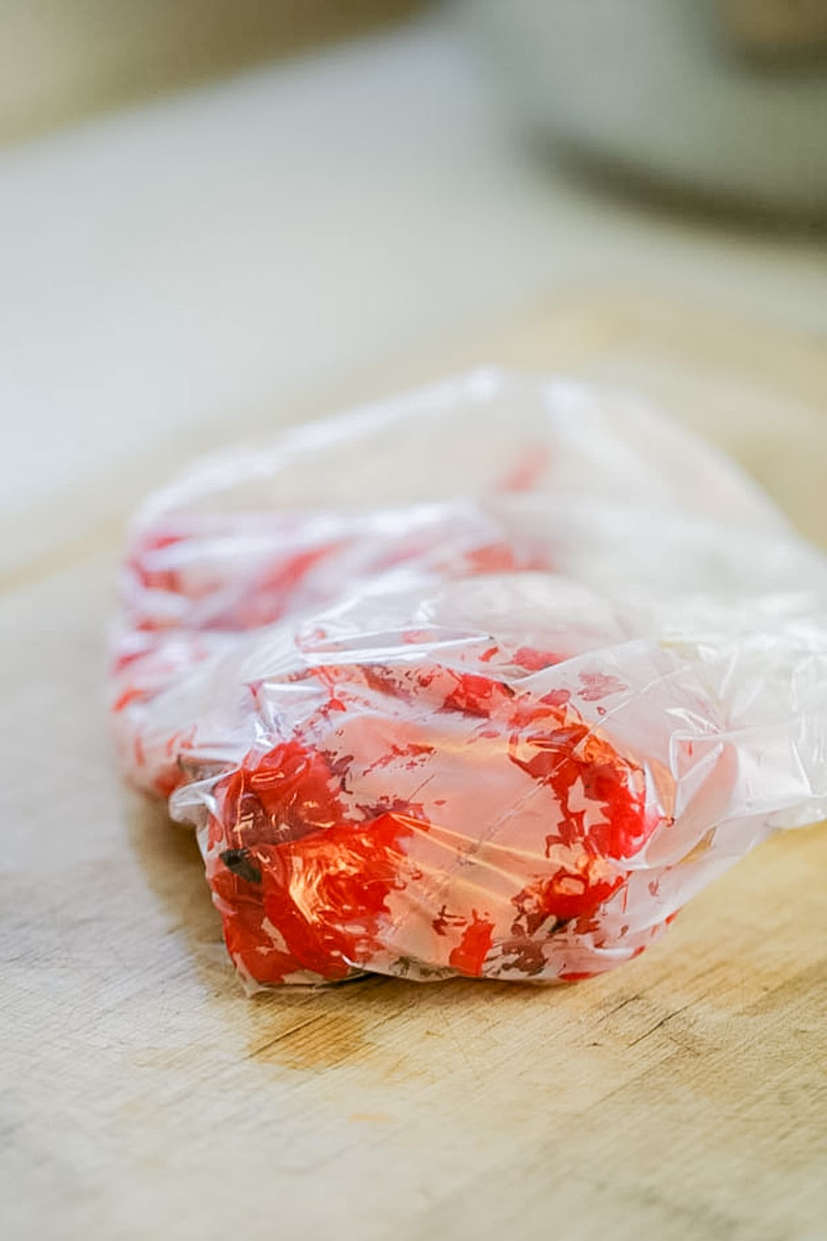 adding peppers to a plastic bag