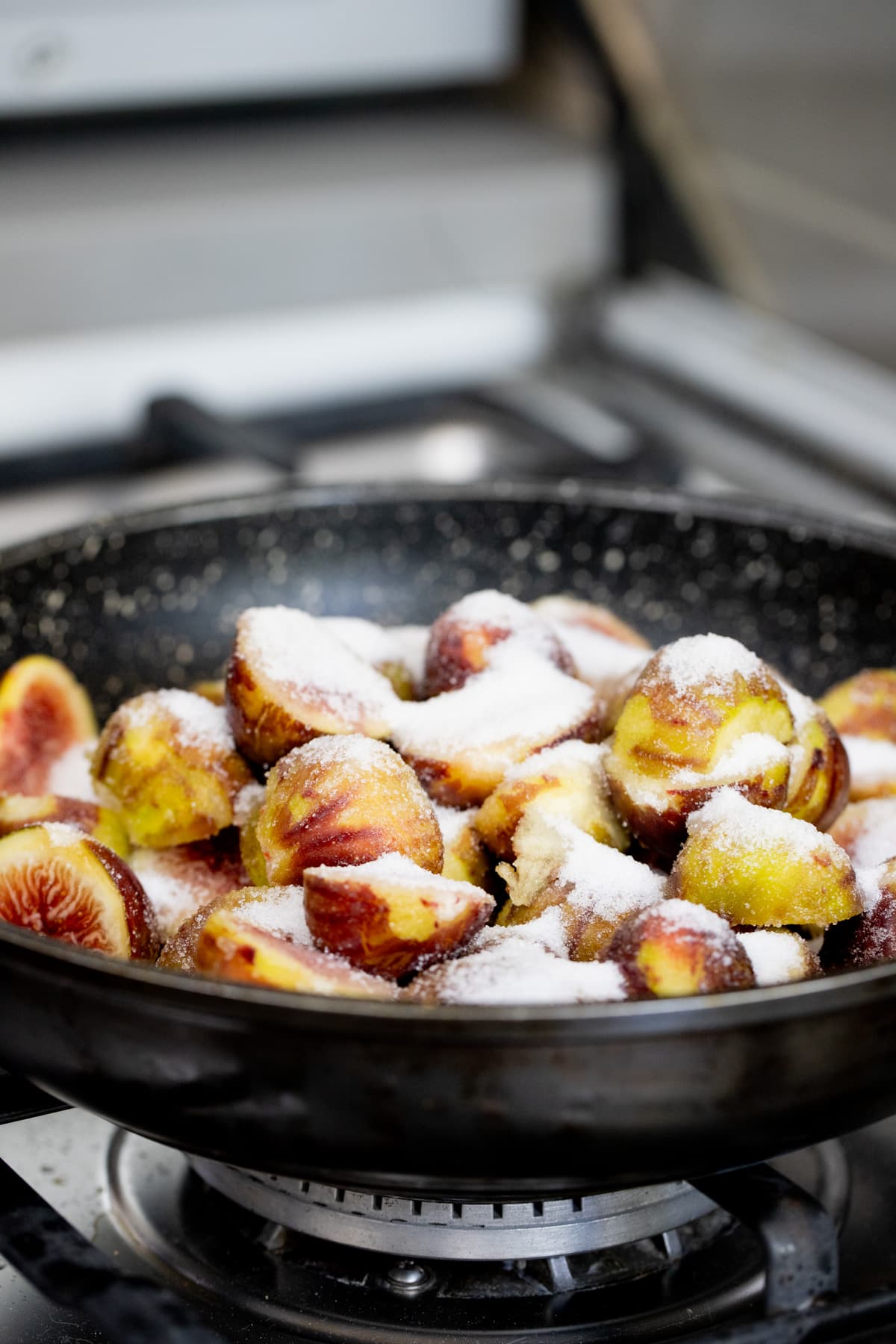 fresh figs in a pan with sugar
