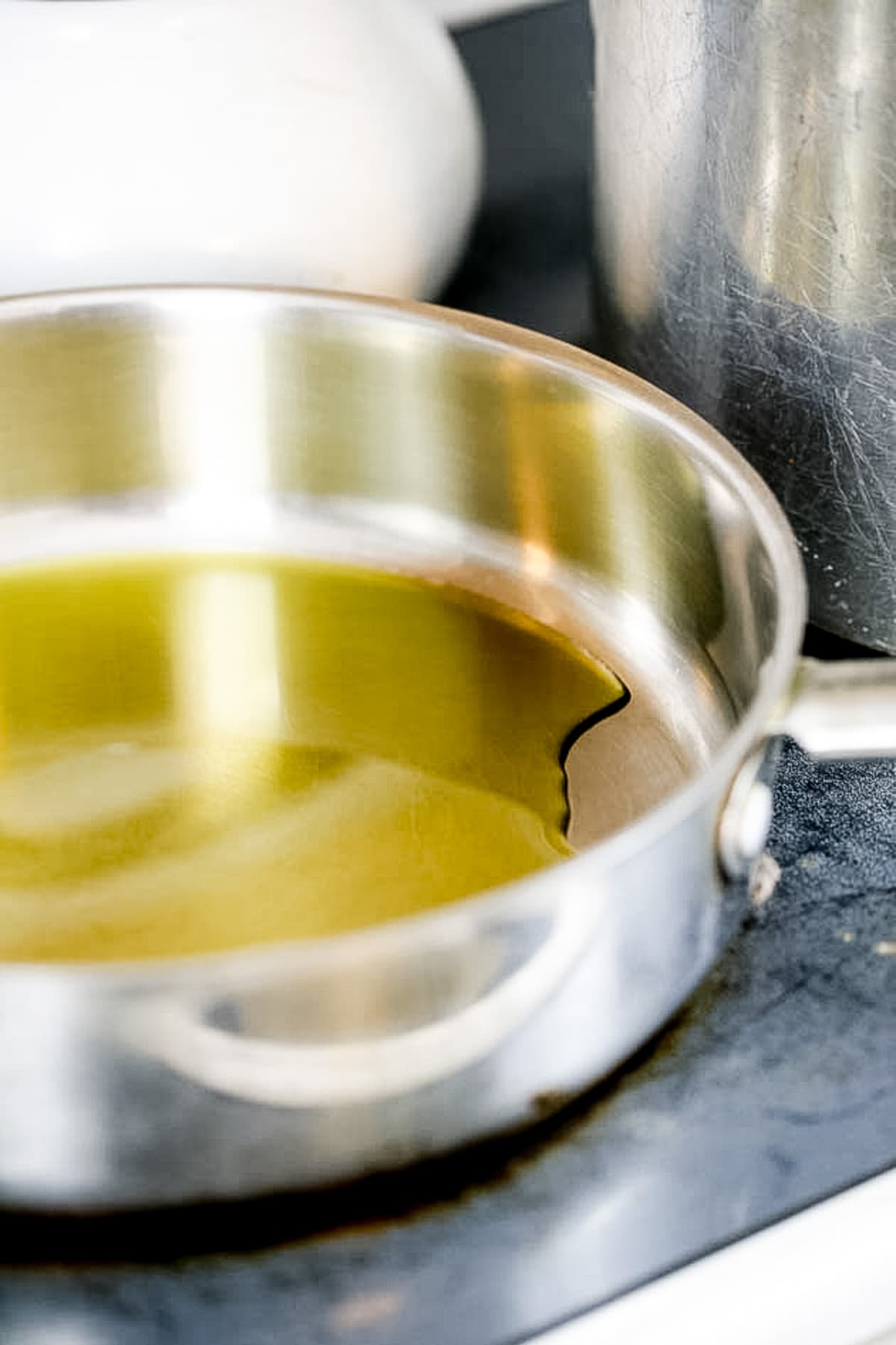 heating olive oil in a pan