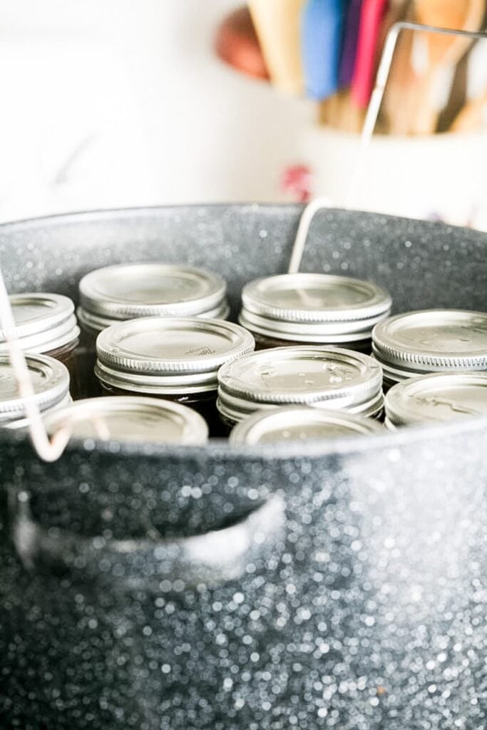 processing the apple butter in the water bath