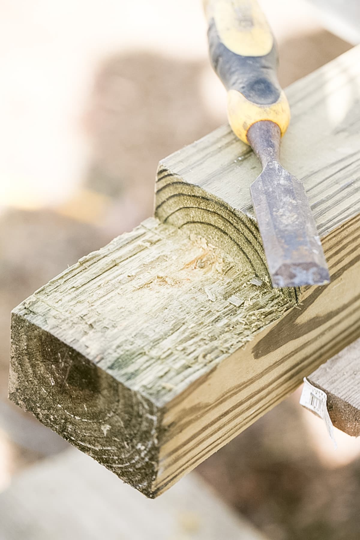 smoothing the lap joint with a chisel