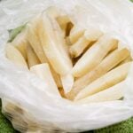 bagging frozen potatoes before placing in freezer