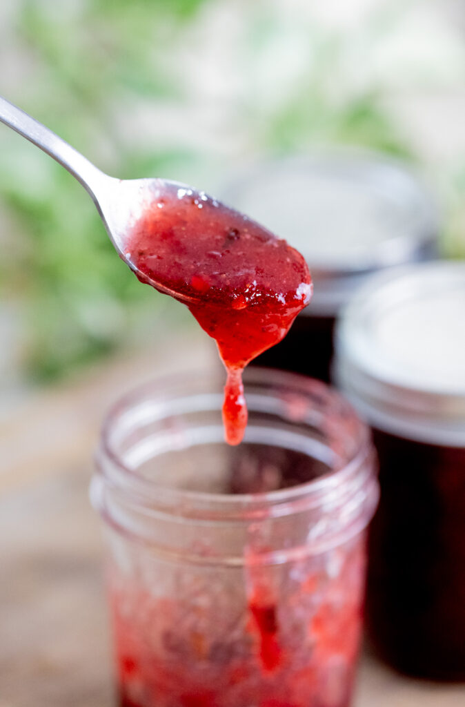 strawberry jalapeno jam on a spoon