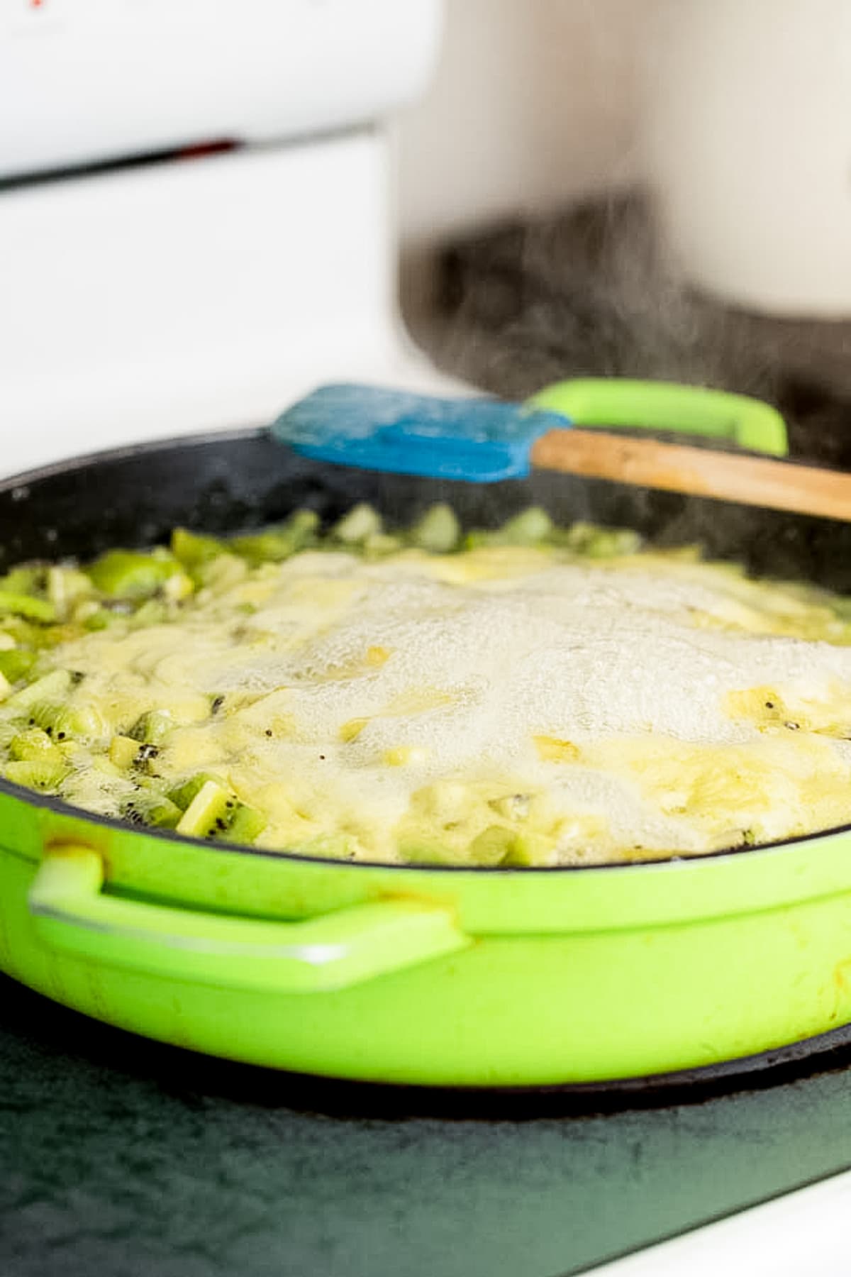 bringing kiwi jam to a boil