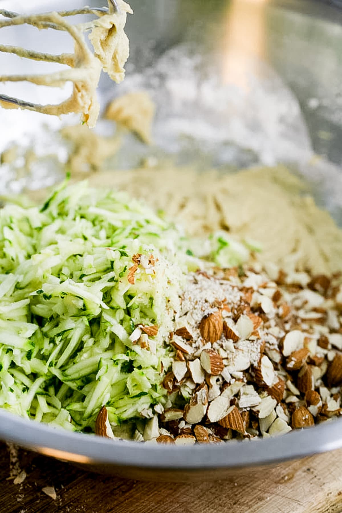 adding nuts and zucchini to batter