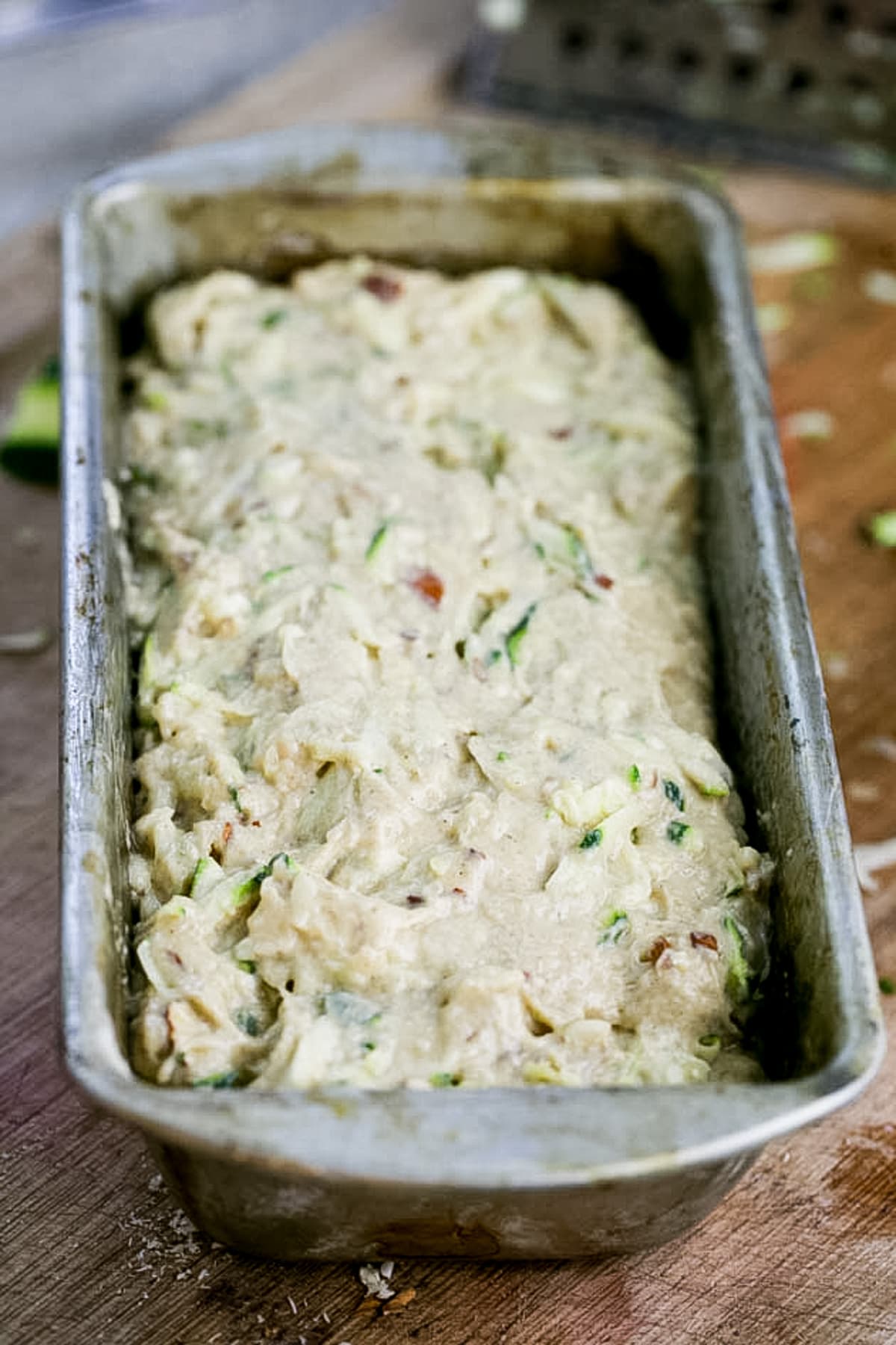 adding batter to a pan