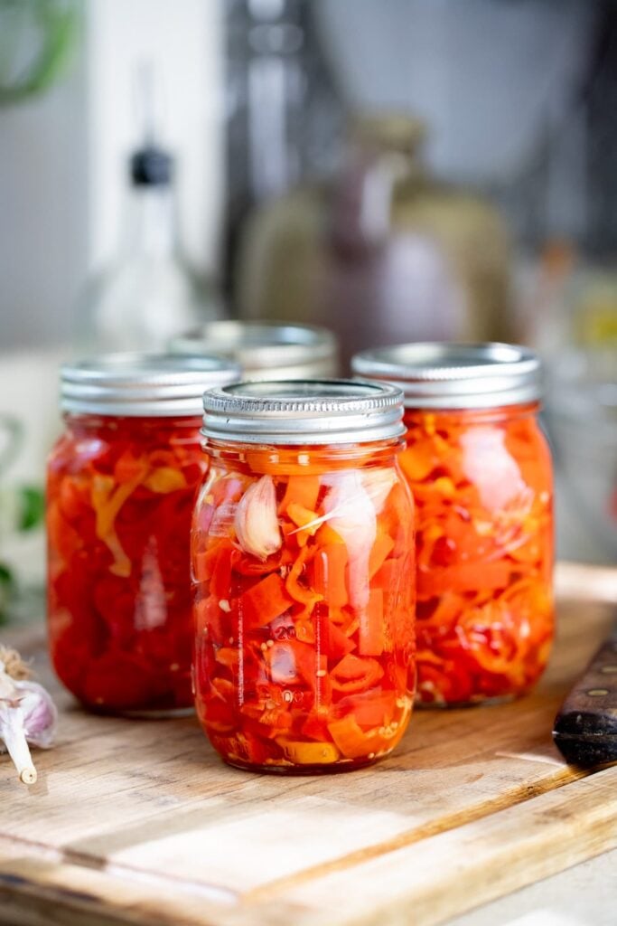 closing the jars of habanero peppers before processing